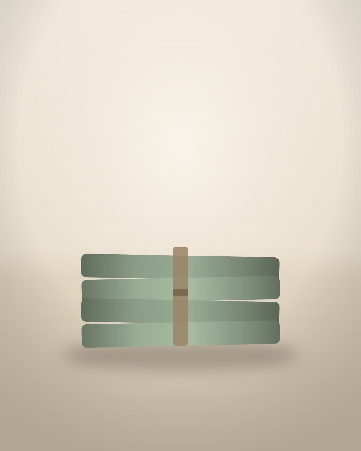 Stack of sage linen napkins with wooden ring